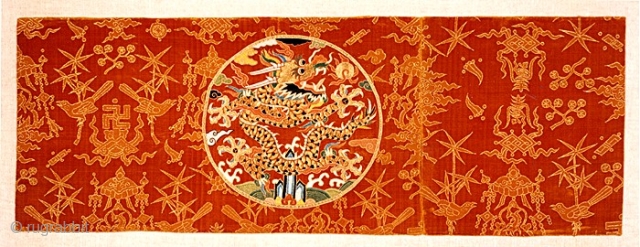 Panel from an Imperial robe, late Ming, or early, Qing dynasty, silk velvet ground with gold embroidered roundel, 14x41 inches.             