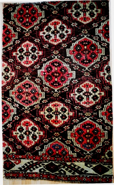 Fragment of Chodor main carpet, 26x42 inches (66x197 cm). Good pile and drawing, great dyes with clear light blue and early pale yellow. 1850-75.         