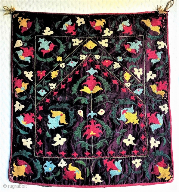 Best of Type collector quality small silk prayer mihrab panel. Made in Shakhrizabs/Samarkand circa 1850. Colorful embroidered drawing on the deep aubergine silk ground is very refined. Original edging and printed cotton  ...