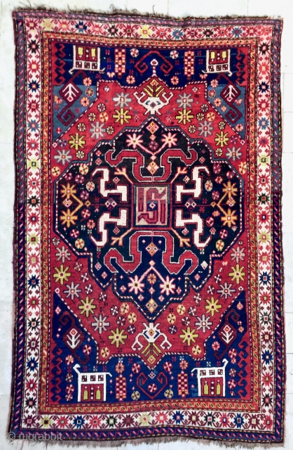 Origin and description: Karabagh rug, family of design "Chondzoresk", with one blue hexagonal medallion, the main white border with star chain design.

Dimensions: 207 cm x 134 cm.

Age: around 100 years.

Condition: overall very  ...