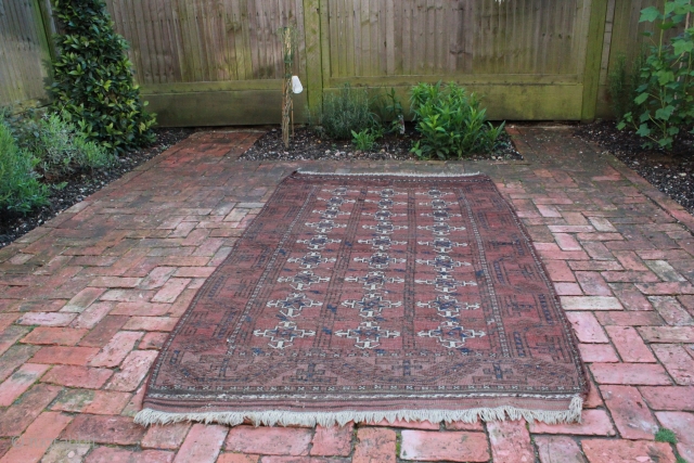 This is an Afghan Baluch rug circa late 19th, early 20th century.  An interesting rug pattern in worn but good overall condition and not broken.  Approximate Dimensions:  6' 6"  ...