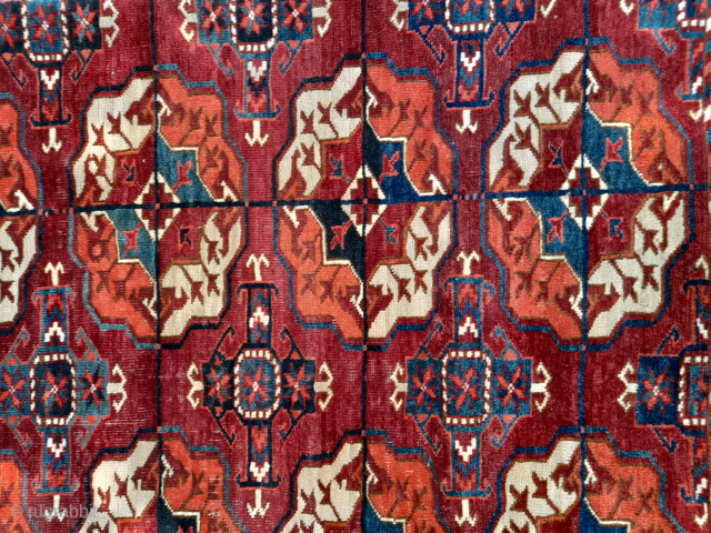 Antique Tekke maincarpet (fragment), 224 x 217cm, "cut and shut", sides not original, some kilim remaining at lower end. Beautiful natural dyes, very fine knotting, dense short pile throughout. (Images taken upright  ...