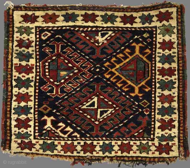 Shahsavan Piled Bagface
Northwest Iran
19th century
53 x 45 cms (21 x 17¾ ins)
Materials:Wool
Technique: Symmetrically knotted
Condition: Good pile, losses to bottom border, one tiny area of moth damage

This brightly coloured bagface captures a section  ...