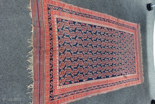 Afshar Neriz Main Rug 4'9" x 9'6". Third to fourth quarter Nineteenth Century. There is a sewn tear on one kilim end. There is one fold wear. There is one old stain.  ...