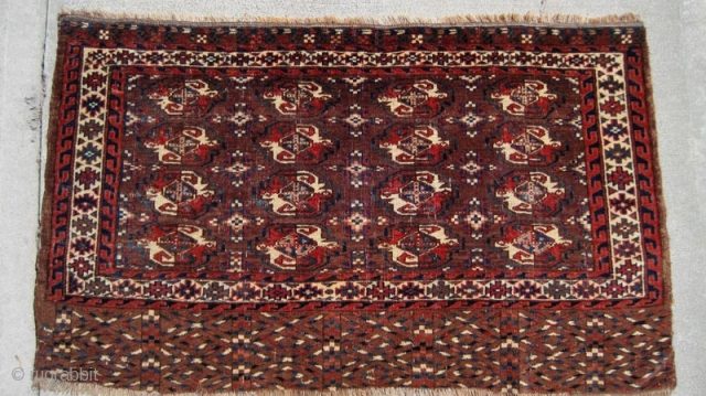 Yomud chuval with interesting colorful elem and unusual secondary guls.  45" x 26".  Overall wear with foundation peeking through, all natural dyes.  Pictures (taken in bright sunlight) speak for  ...