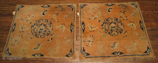 A pair of Ningxsia Mats, Mid-19th Century, 2' 8" x 2' 6" and 2' 8" x 2' 4" in size.  Additional images and condition report available on request.    