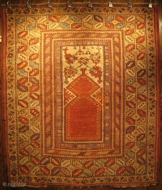 A Melas Prayer Rug, Circa 1875, 4' 6" x 3' 11".  This rug has some repairs, mostly along the perimeter, but is in generally good condition.  Will send detail images  ...