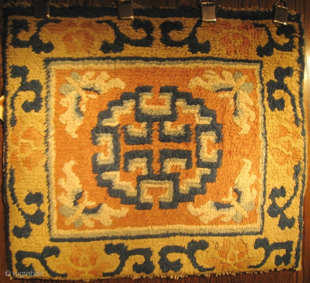 Ningxsia Mat , 19th Century, 2' 0" x 1' 9".  Full pile, missing two rows of indigo knots at bottom.            