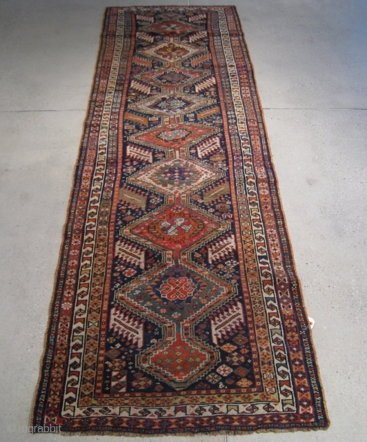 A Late 19th Century Q'ashqa'i Runner, 8' 8" x 2' 8".                      