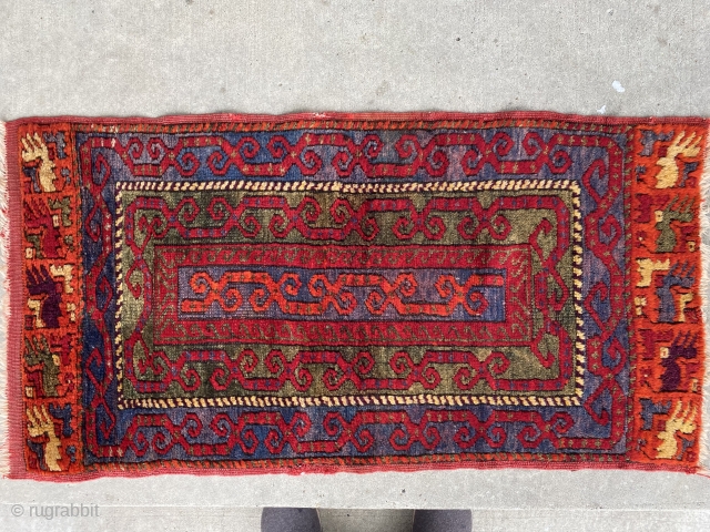 Turkish yastik with unbelievable color and condition. Sivas areaI think. Purple, green, yellow, and blazing scarlet, as is typical of this weaving group.          