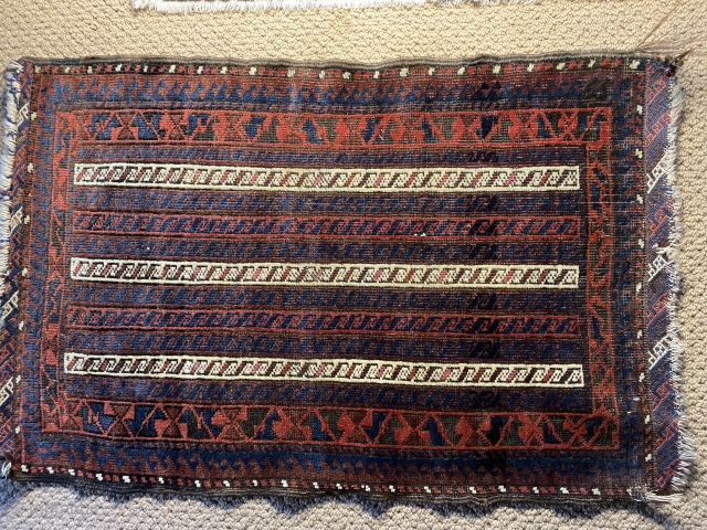 SOLD! Baluch balisht with full pile and great graphic appeal. Areas of cochineal purple. Very good condition.                