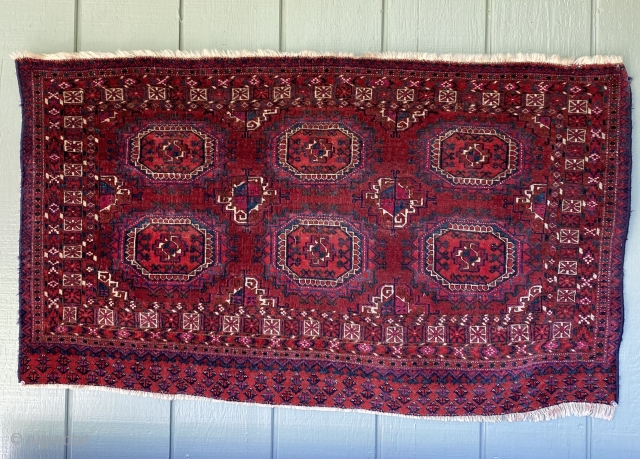 SOLD Antique Tekke Chuval: very finely knotted and fine detail. Intense color including cochineal based. One synthetic red which hasn’t affected adjacent colors. 47” x 27”. Good condition with some areas of  ...