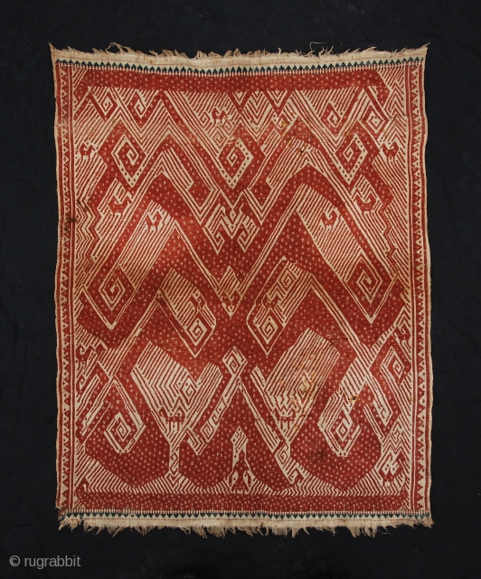 Tampan with unusual design: a single human like figure on a boat with above a dynamic atmosphere with spirals and animals (birds). It's a ceremonial textile from Sumatra. 19th century. Size 65  ...