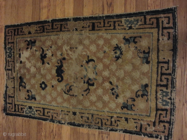  Ningxia carpet. Obvious wear, some holes and fraying around the edges. 3'1" x 1'10"


                  