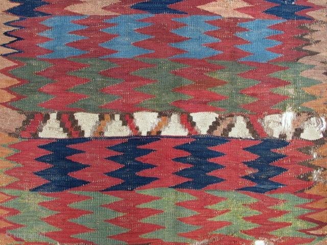 Early Kurdish Kilim,100x270,beautiful old colors,very effective design,proffessionaly mounted on linen.                       