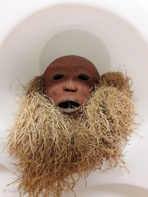 Antique Makishi mask (Zambia) in clay and wood. 

                        