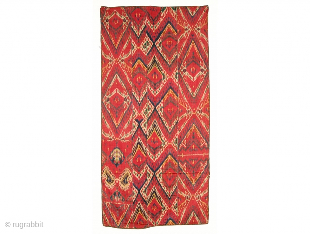 Uzbek Six-Color Ikat Wall Hanging, 19th C. Cotton. Size: 6'9'' x 3'3'' (206 x 99 cm). Composed of six colors, which is a sign of the maker’s skill. The colors would have  ...