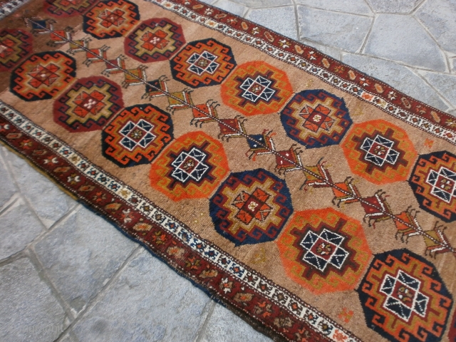 Carpet # 251 * Size   cm.  287 x 115.
AZERBAYDJAN MESHKIN camel-hair.
Pile, warp and weft All Wool. 

In good condition
This carpet has been Washed recently.
Moghan design gol.
Other info or pictures  ...