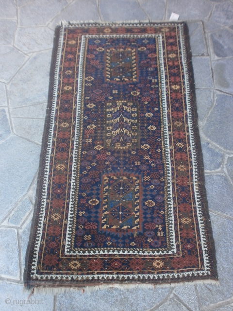 Antique fine BALOUCH carpet.
May-be a Belouch knotted to ARAB tribe. 
In good condition = FULL pile.
Only damages upon the ends.

SIZE: cm. 170 x 95. circa
Great design and colors for this
very original piece.
The  ...