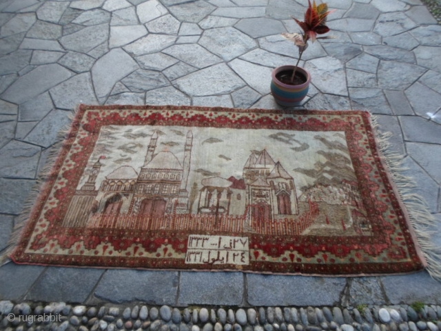 208x118 cm Antique dated 1331/1333 Egira (moon) = Gregorian calendar 1912/1916 (soon).
In very good condition (only 3/4 little old repils).
Very original pictorial carpet with PANORAMA of Bisanzio (Costantinopoli).
Fastened colors vegetal. 
More info  ...