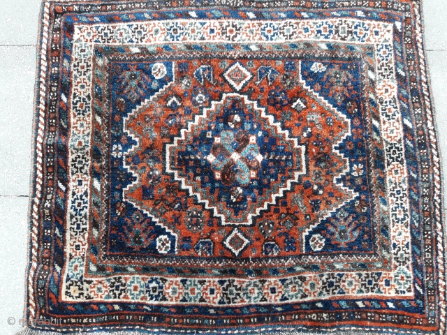 0008  Full pile Qashqai Shiraz rug from circa 1900-1910...It hes been used on the table .. All natural colours ...Size is 100x90 cm (3.2x2.9 feet)       