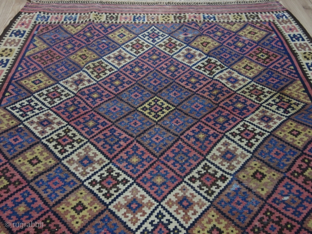 Eastern Kurdish kilim. Circa 1950. Wool on cotton. Good condition.

Size: 147 cm x 231 cm (58” x 91”).               