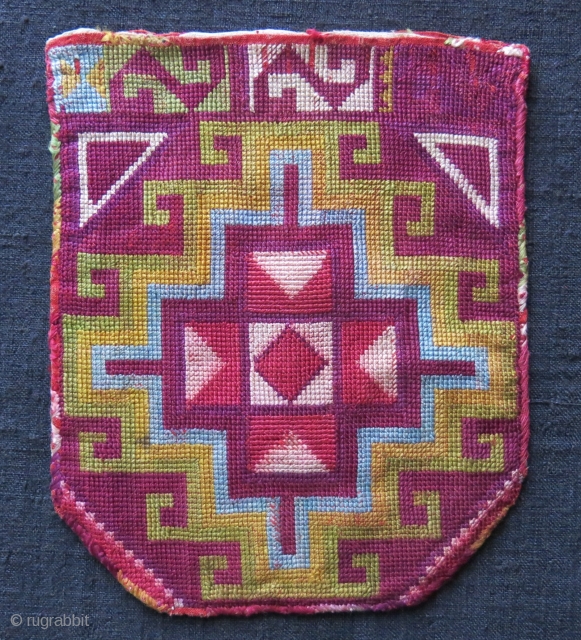 Tajikistan Lakai silk embroidery bag. Both side cross stitch fine embroidery, tiny wears and little stain on one side lower left. Circa 1900. Size: 7” by 5.5” (17 cm X 14 cm).


 