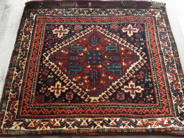 Qashkai pile bag with original backing and closure braided loops. Saturated colors. 19th c. Size: 63 cm x 72 cm (24.8" x 28.3").          