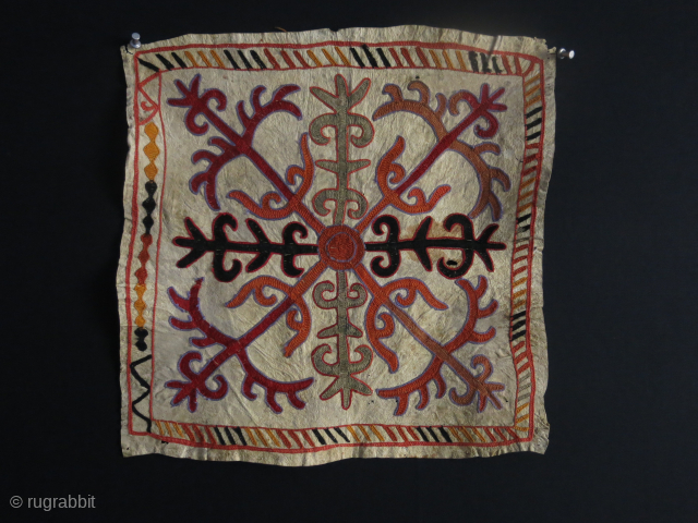 Kirgiz talisman hanging. Wool embroidery on soften leather. Traditional zoomorphic motifs. Circa 1920-40. Size: 40 cm x 40 cm (15.7" x 15.7").           