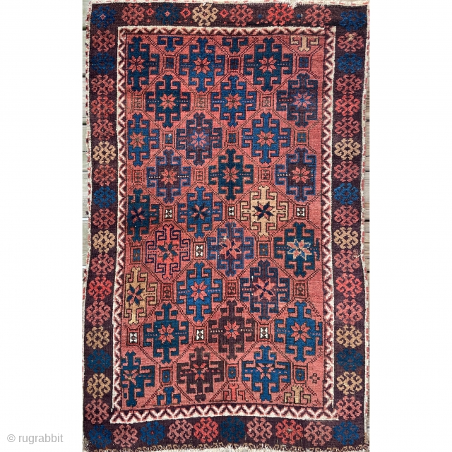 Antique Baluch with beautiful natural colors including a deep purple border and randomly arranged yet harmonious colors in the field creating a visually appealing overall appearance. Circa 1870-75 - 2’9 x 4’4  ...