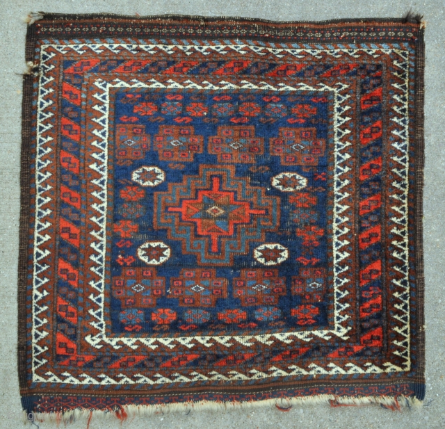 Unusual Baluch bagface with Memling Gul, heavily depressed warps, natural colors - 27 x 26 - 68 x 67 cm.             
