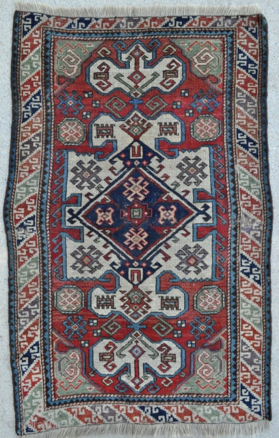 Compare to a piece in the Rudnick's collection - South Caucasian Rug with rare drawing and beautiful colors including a clear green and light purple/lavender, probably from Karabagh area, small size -  ...