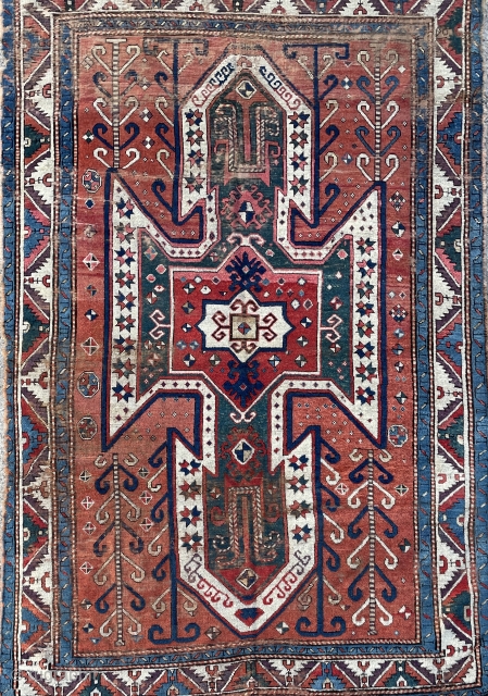 Early Kazak Caucasian Rug for the discerning collector with clear aubergine, spacious drawing and tight weave. Its probably me imagining things but I see four eagles in the field corners facing inwards!  ...