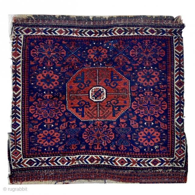 Timuri Baluch Bagface with Star in Octagon surrounded by Guli-Khaf patterns and framed by a well drawn ivory border - Silky glossy wool pile, a bit rough around the edges and old  ...