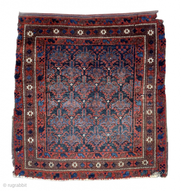 A Dokhtor-e-Ghazi Timuri Baluch Bagface for the discerning collector. A rare find in my experience since this group wove predominantly Prayer Rugs! This is the first Bagface I have encountered over the  ...