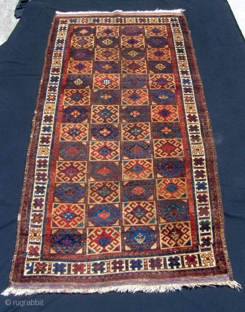 Timuri rug, 33 X 69".  Evenly low pile, but no wear spots, tears, holes or stains.                