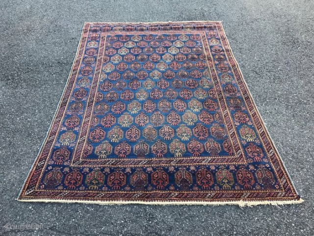 Afshar, c. 1940. 229cm x 152cm. Wool on cotton, full pile with minimal wear. Double boteh design.                