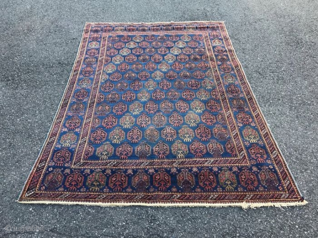 Afshar, c. 1940. 229cm x 152cm. Wool on cotton, full pile with minimal wear. Double boteh design.                