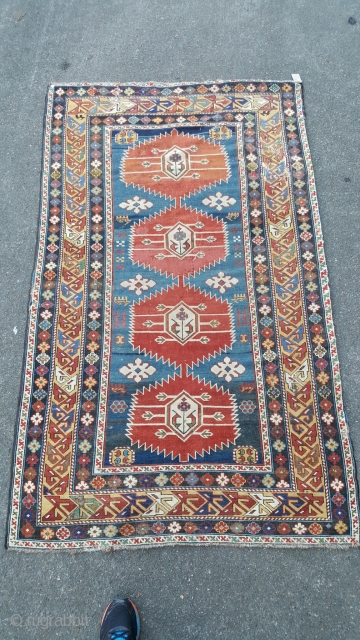 a Fine mid 19th century karagashli of unusual rug size 180 x 115,
old repairs some damage and backed but nice early colours.           