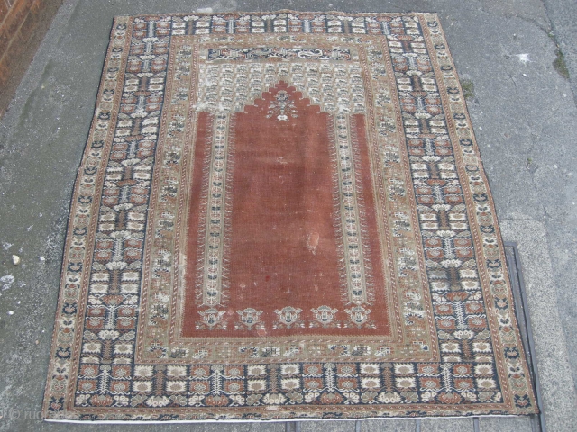 An Antique Giordes rug late 19th century , backed and ready to hang. Approx 4ft8 x 3ft8,                