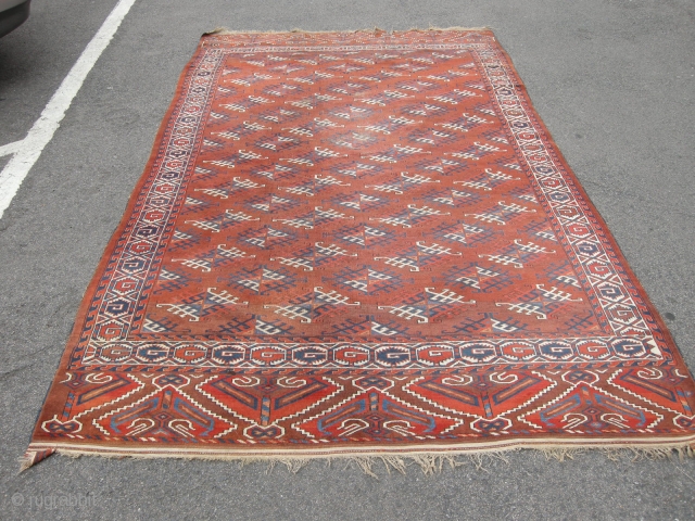 A good late 19th century Yomut carpet approx 9ft6 x 5ft6. Generally sound condition, some low area to the centre and damage to one end, can be repaired or used as is.  ...