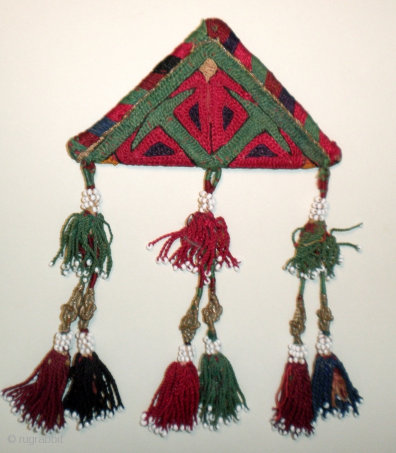 Here is a beautifull old Ersari Turkoman embroidered Talisman,
which would have been worn to ward off evil. The talisman 
measures 4 1/2" wide and 6" tall. These are made of silk thread
embroidered  ...