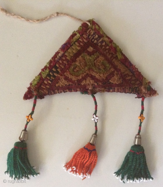  In the Central Asian Republics, people have made amulets in the shape of a triangle using felt, cloth or silver

             ...