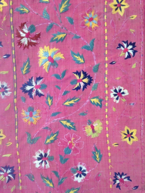 Beautiful Indian Silk embroidery ( Kujarat ) fragmentery transformed to a Summer carpet but it was probably a lrger bed cover as origin ! 
the center was added ( apliqued ) probably  ...