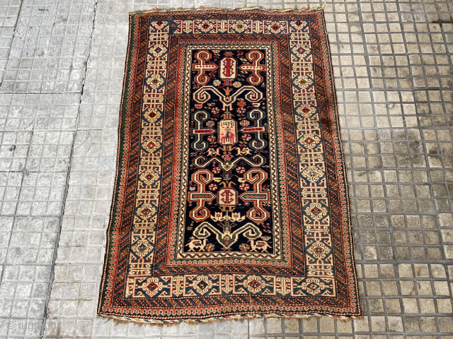 A very fine perepedil shirvan rug size 150x100 cm in very good condition with unusual kilims in the ends from both sides 
Dated 1319 Hijri
In the middle it shows a human riding  ...