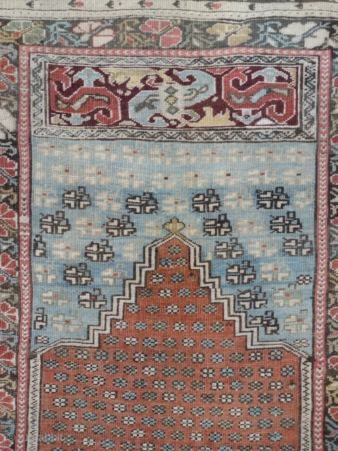 This is an antique Ghiordes Rug woven circa 19th century and it measures 175 x 130 in CM.It has a beautiful design with nice color pallette. Generally in a good condition.  