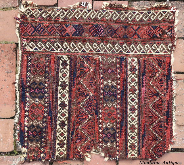 Flatwoven Baluch Bag fragment--  approx 17 × 18” 

Complex weft wrapped fragment from a bag face. Likely West Afghanistan. Well traveled ethnographic textile. 
Ex James Douglas personal collection. Mr. Douglas was  ...