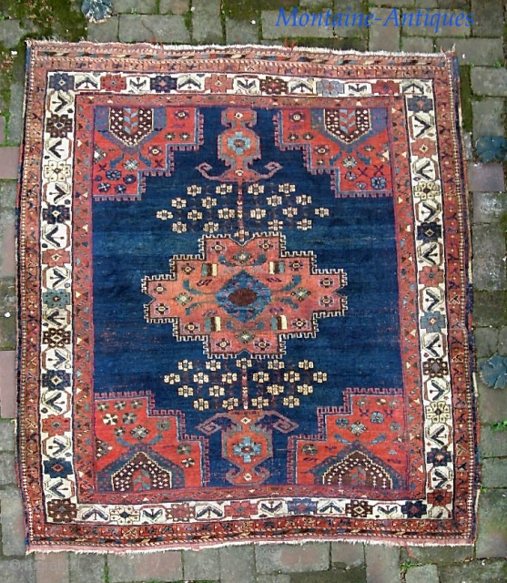 Afshar-- 4 ft 4 in x 5 ft 3 inches. Classic 19th century medallion Afshar. Soft with lovely shiny wool. Some exposed wefts in the indigo areas-- typical of these things. But  ...