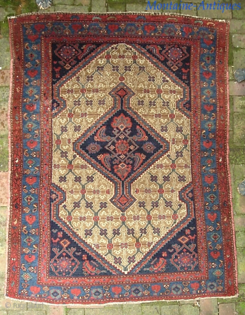 Kurdish Kolyai-- 4 ft 2 x 5 ft 11.  Kurdish camel medallion on wool foundation.  Classic lattice field with fine and somewhat unique drawing. Its a little bit tatty around  ...