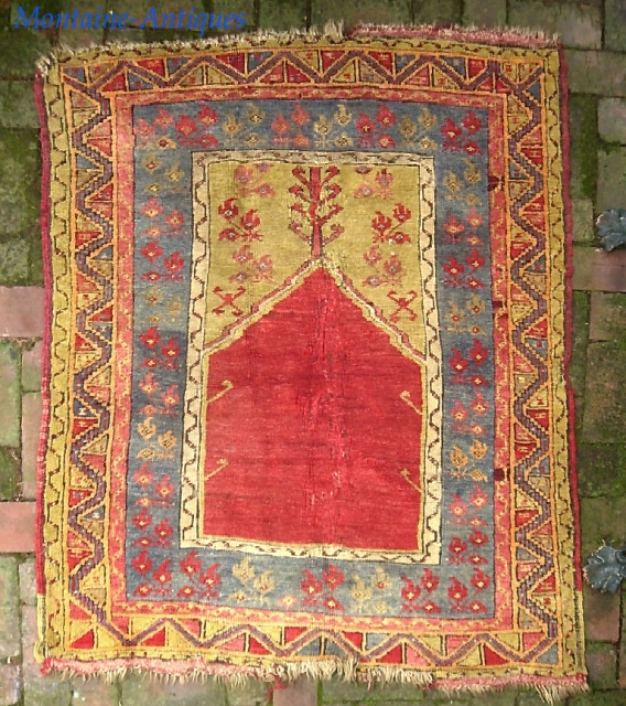 Old Anatolian-- approx 3 x 5. Possibly an antique Mudjar(?) And God knows how old. It looks ancient. Thick and floppy with really nice colors. What's going on in the middle? frayed  ...